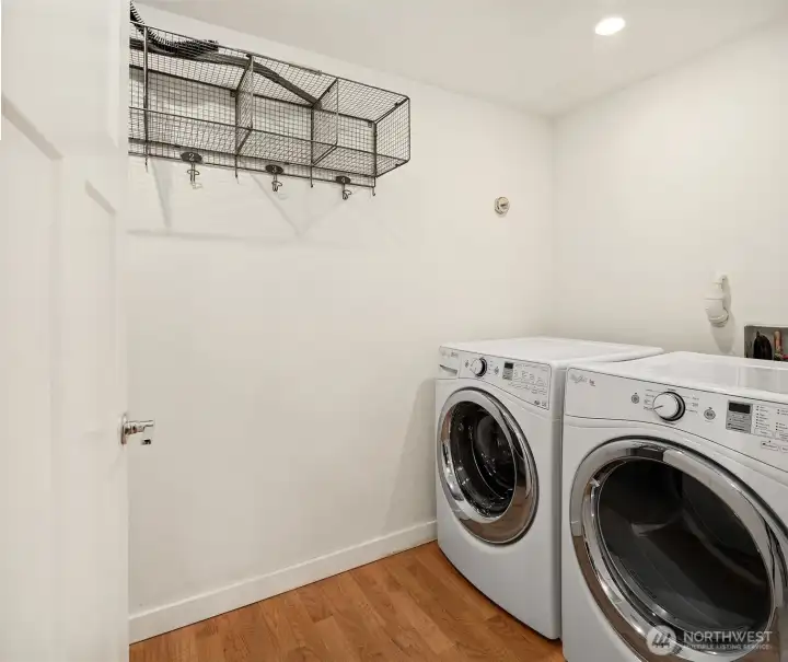 Lower level laundry room with storage.