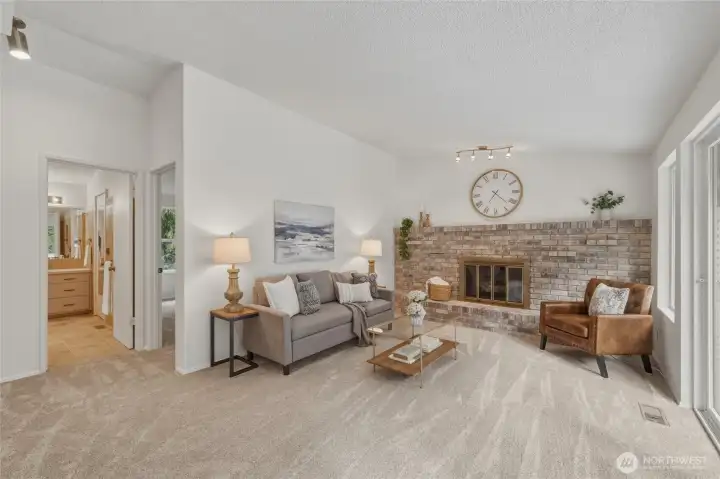 The family room is cozy with a gas fireplace.