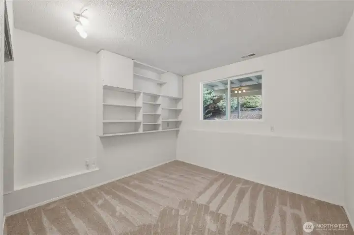 Downstairs are two good sized bedrooms. This one is at the back of the home.