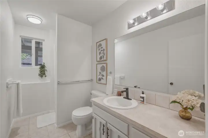 The lower floor bathroom has a shower and freshly painted.