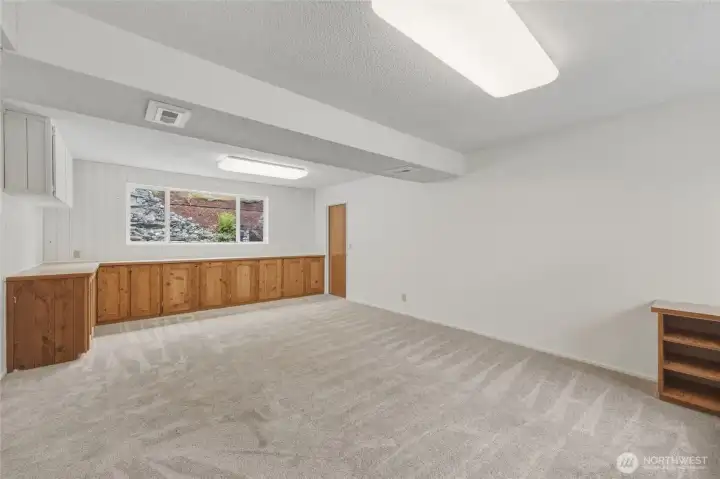 Downstairs is another large bonus rec room.