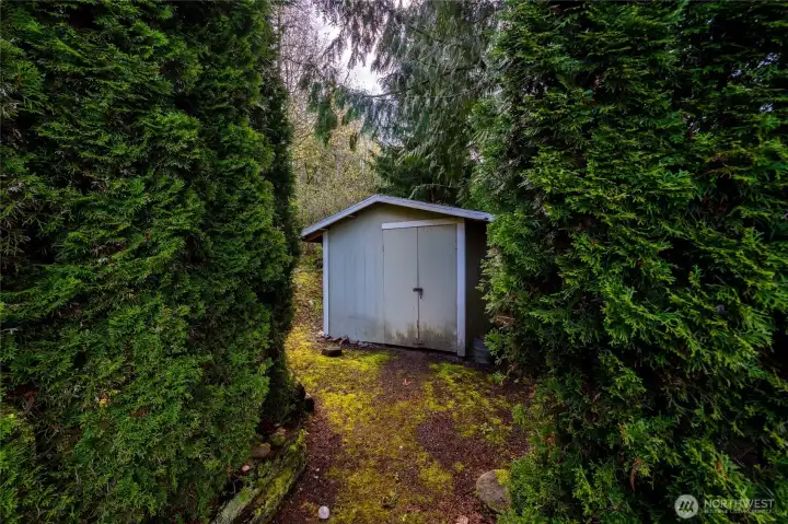 A storage shed is onsite for your garden tools.