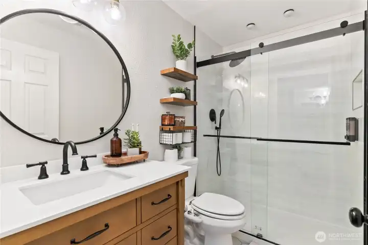 Lower-level ¾ hallway bath—tastefully remodeled