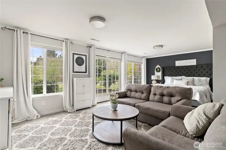 Lower-level huge bonus room—currently used as a second primary with fireplace & wet bar