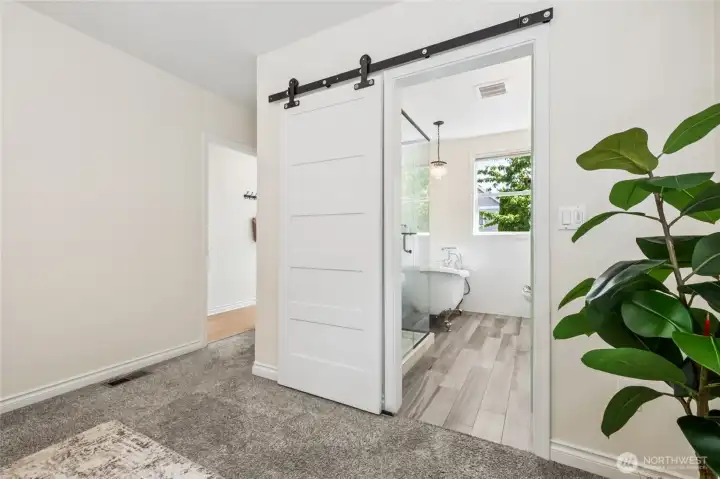 Primary bedroom with ensuite bath.
