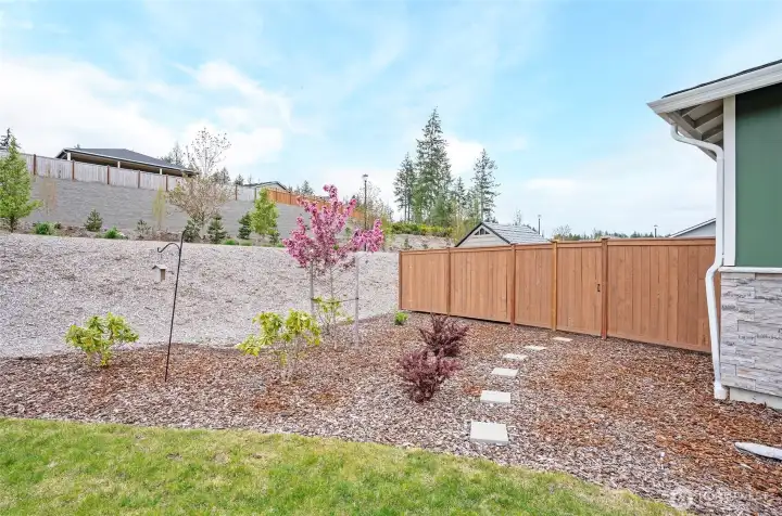 Side yard with gated back yard fence