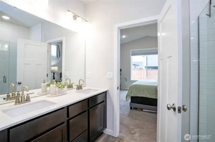 Primary bath with double sinks and separate water closey
