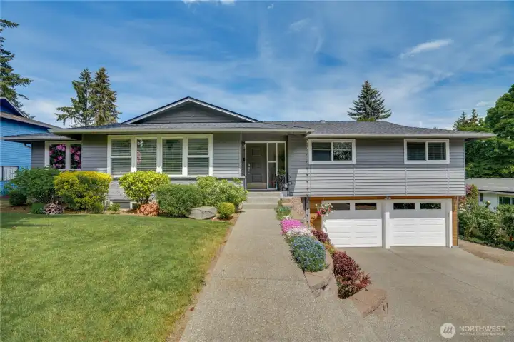 It feels like home from the minute you walk through the doors of this stately Fircrest home!  Light and bright with new windows, trim, and spaces for all your wishes - Live on one level; and/or use all the bonus space downstairs.  Welcome!