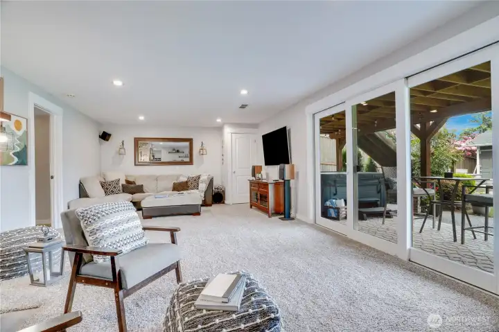 These large sliders provide access to the hot tub and lusciously landscaped yards, shed/shop, garden beds and fire pit.  RV and Toy Parking, too!