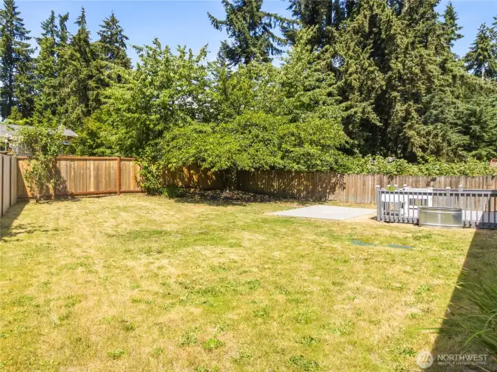 Fully fenced backyard.