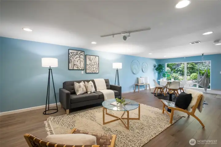 Large living room on the lower level for hanging out and playing games (featuring karaoke spotlight). Large living room on the lower level for hanging out and playing games (featuring karaoke spotlight).