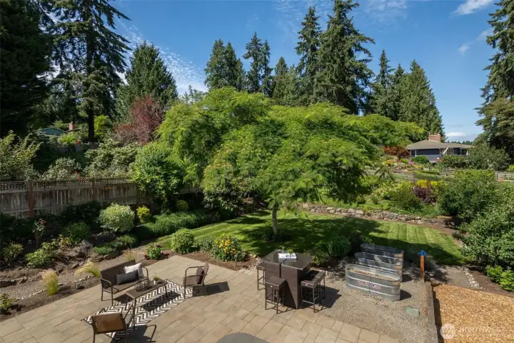 View of backyard from the elevated back deck. View of backyard from the elevated back deck.