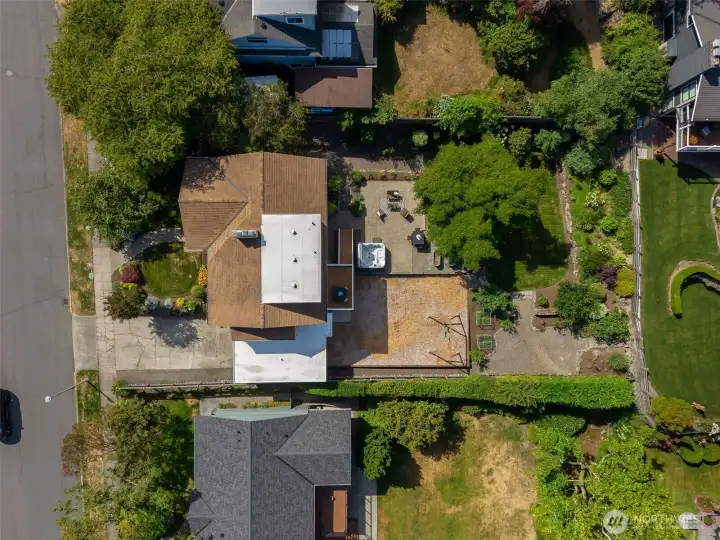 Aerial of property showing all the areas: grass, gardening, play-area, hosting & entertaining, and back deck. Aerial of property showing all the areas: grass, gardening, play-area, hosting & entertaining, and back deck.