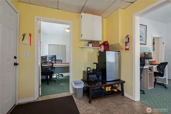 Central break area conveniently located between multiple office space.