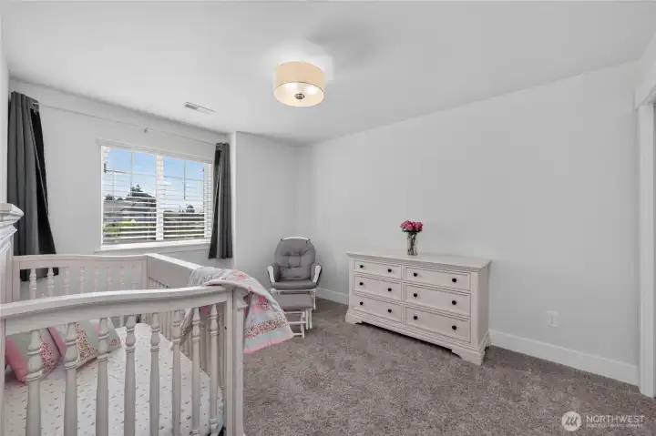 This bedroom looks over cul de sac.