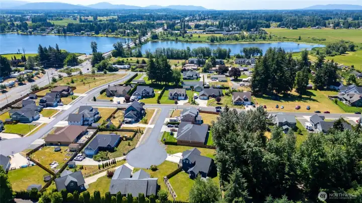 Great mid-county location with easy access to Lynden, Ferndale or Bellingham. Home sits at back of cul de sac. Roads recently resealed. Open area in photo on top right is playground and community space for Wiser Ridge neighborhood. Great mid-county location with easy access to Lynden, Ferndale or Bellingham. Home sits at back of cul de sac. Roads recently resealed. Open area in photo on top right is playground and community space for Wiser Ridge neighborhood.
