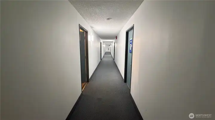 Hallway. The condo is the first one on the left Hallway. The condo is the first one on the left