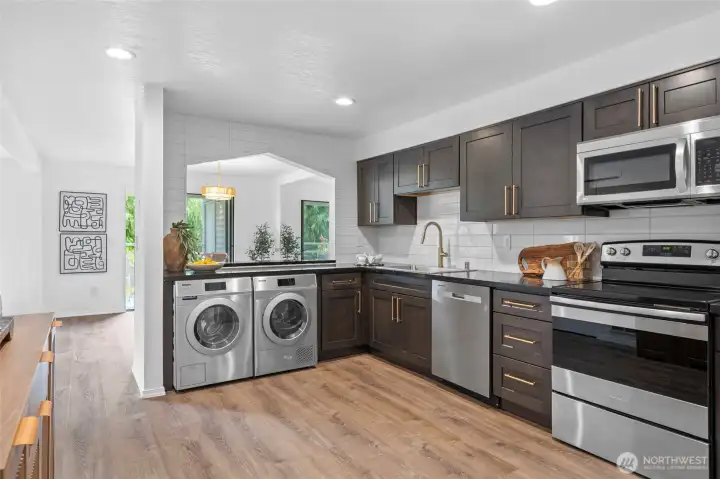 Hall to kitchen. Hall to kitchen.