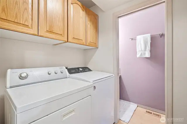 Laundry room on main level with guest bathroom