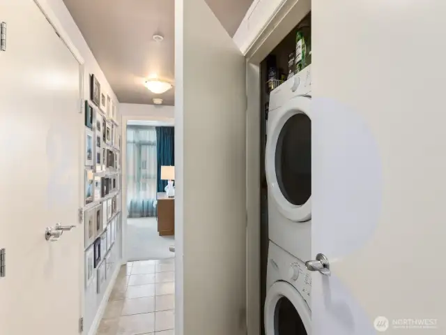 Hall leading to bedrooms with several closets for linens, storage & laundry closet.