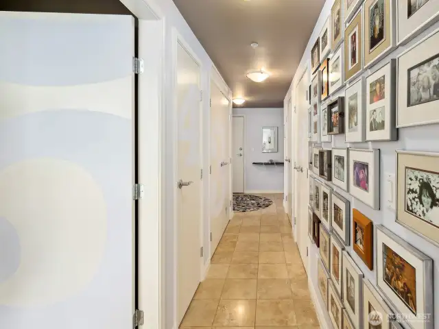 Looking from the bedrooms down the hall to the front door.