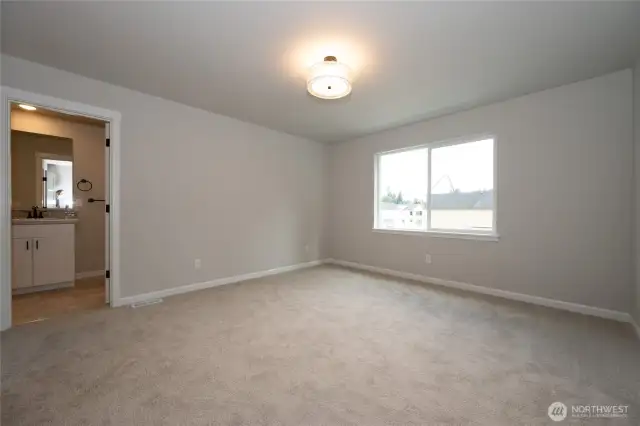 **Photos are of the same floorplan in another community. Specs, colors and features will vary**