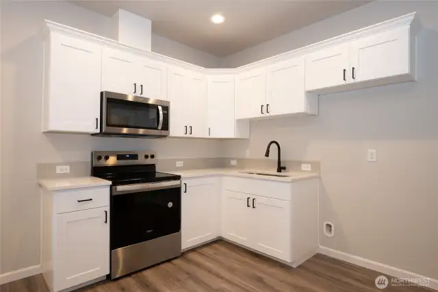 **Photos are of the same floorplan in another community. Specs, colors and features will vary**