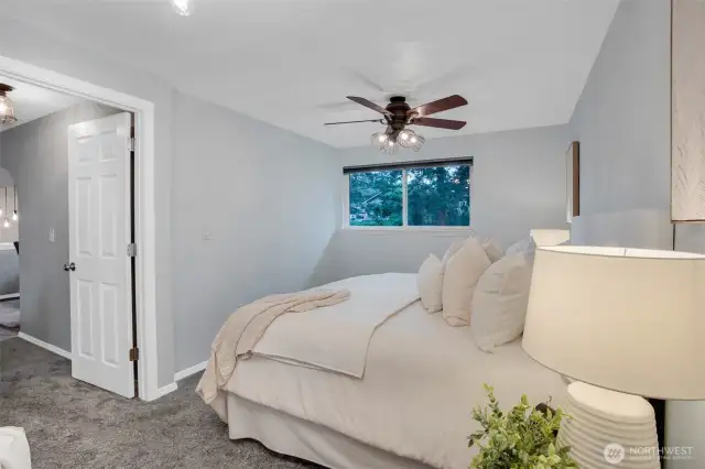 Another view of the primary bedroom.