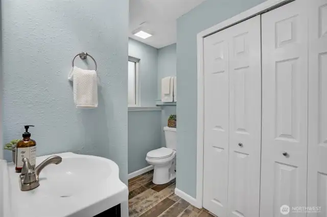A well-dressed three quarter bath on the lower level.