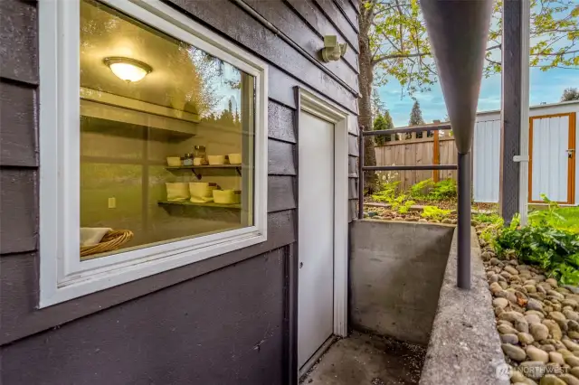Lower-level access door to laundry/mudroom.