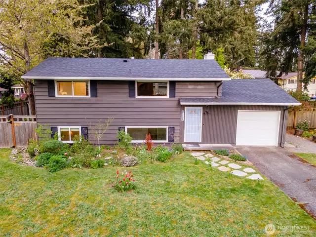 One car attached garage with ample driveway parking.