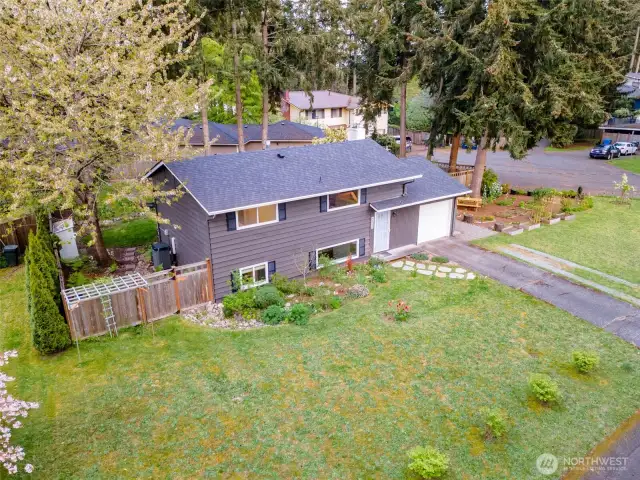 Tucked in among mature trees, this lot offers loads of privacy.