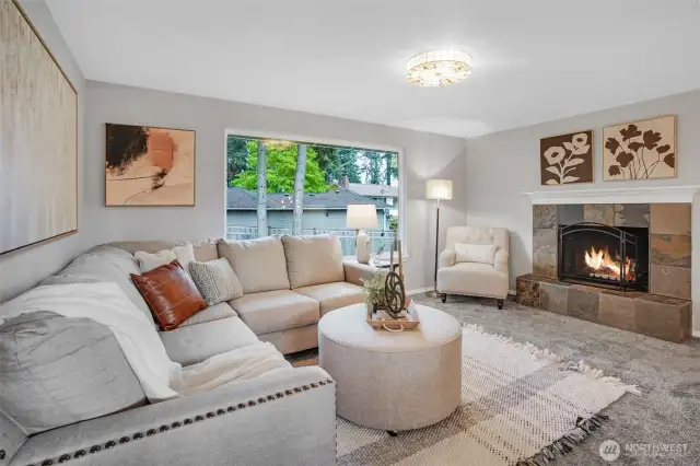 A warm slate fireplace is the perfect focal point to the room.