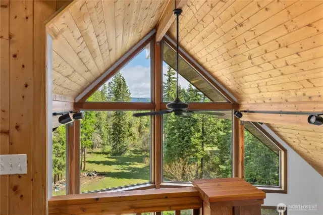 View from the Primary Suite bedroom in the loft! Gorgeous t&g vaulted ceilings for a gorgeous cabin ambiance.