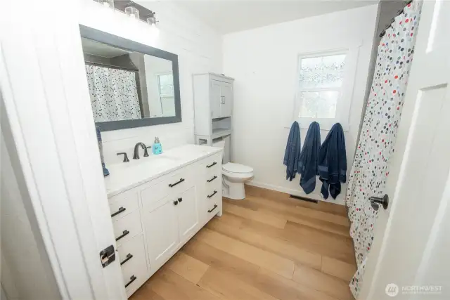 Main bath has plenty of room, and an XL tub.