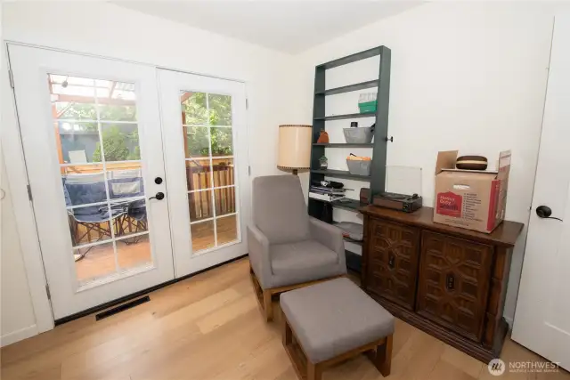 Study or 3rd bedroom with French doors to covered deck.