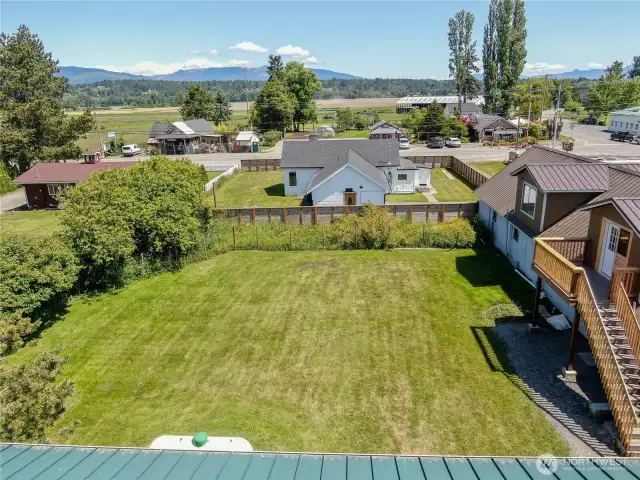 Large flat, fenced lot with an updated rambler