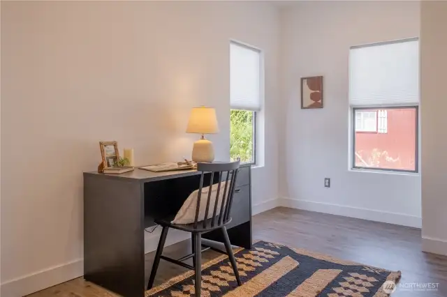 The second bedroom is staged as an office but has plenty of space to be a great bedroom as well
