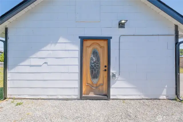 The garage has a man-door on the back