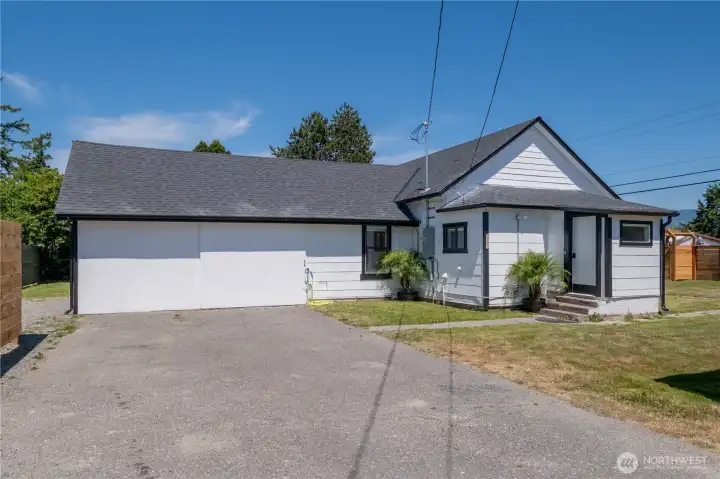 Zoned Residential/Commercial. Garage could be converted to Office/Additional Living Space or a 2nd Living Space