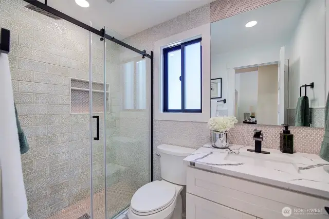 Main floor guest bath with designer finishes