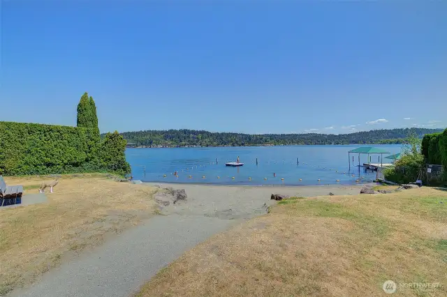 Private swim beach with floating dock