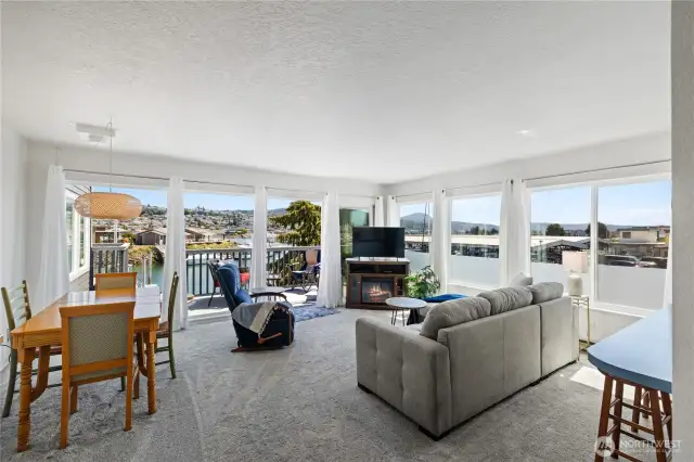Lots of windows and natural light.  Water and Marine views abound! Newer carpeting throughout.  Furniture is included!  Ready for you to move in and enjoy!