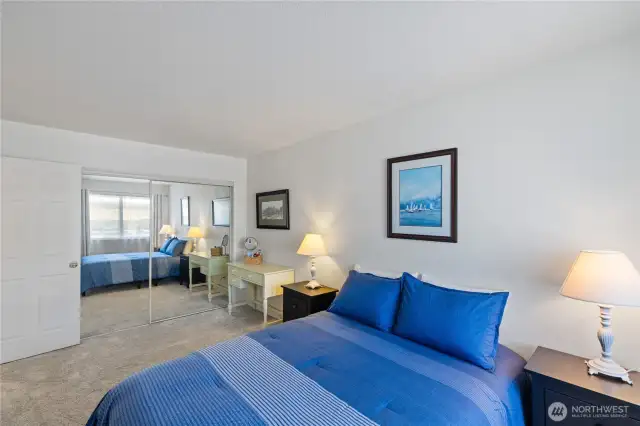 This photo shows the Primary Bedroom and mirrored closet.  That is brand new carpeting fir your feet only. ;>)