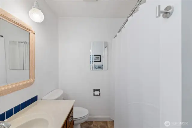 Full bathroom on the right side when you enter.