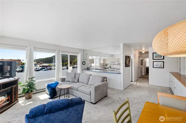 The living and dining room are perfect for Funiture arrangement.  Come see this light, "happy" home!