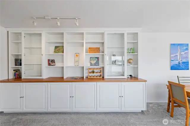 This wall storage, display unit is the perfect complement for this space.  Store games, books, music, and so much more. Front and back lit display shelves for your art work or collectables.