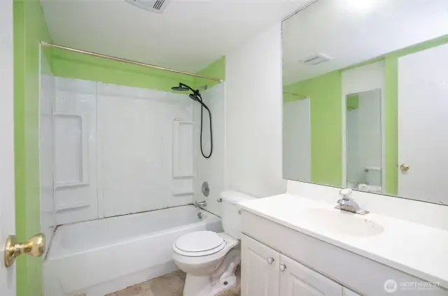 Full guest bathroom off the main hallway.