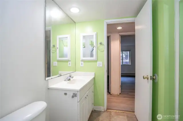 Additional view of the full guest bathroom conveniently situated off the main hallway.
