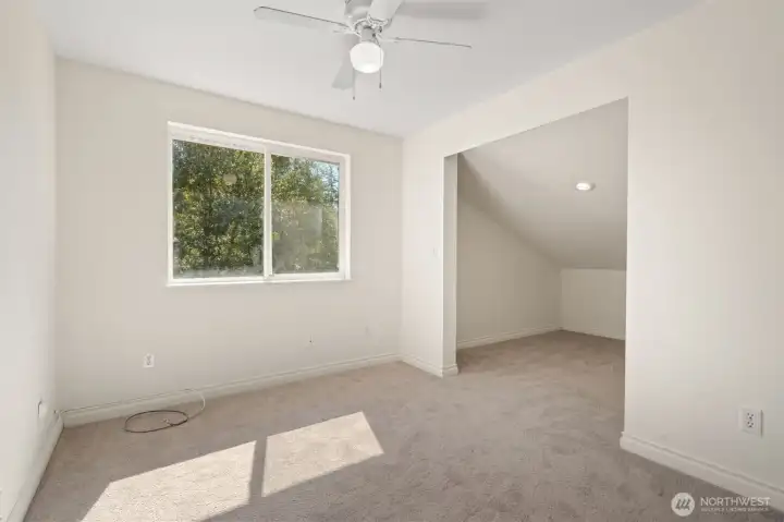 Second bedroom with attached space--playroom, storage?